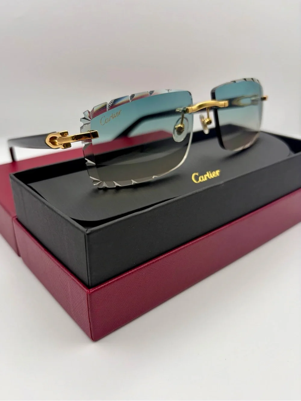 Cartier Rimless Sunglasses in Black and Gold